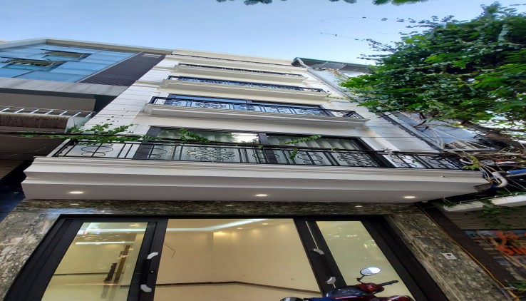 Bán Tòa VP mới, đẹp phố Thái Hà. 70m 7T MT4.5m. Oto tránh, Kinh doanh, Thang máy. 21 tỷ. 0836797686